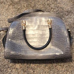 Carlos Santana faux snakeskin purse